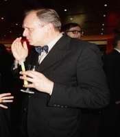 Ulrich Tukur consuming alcohol